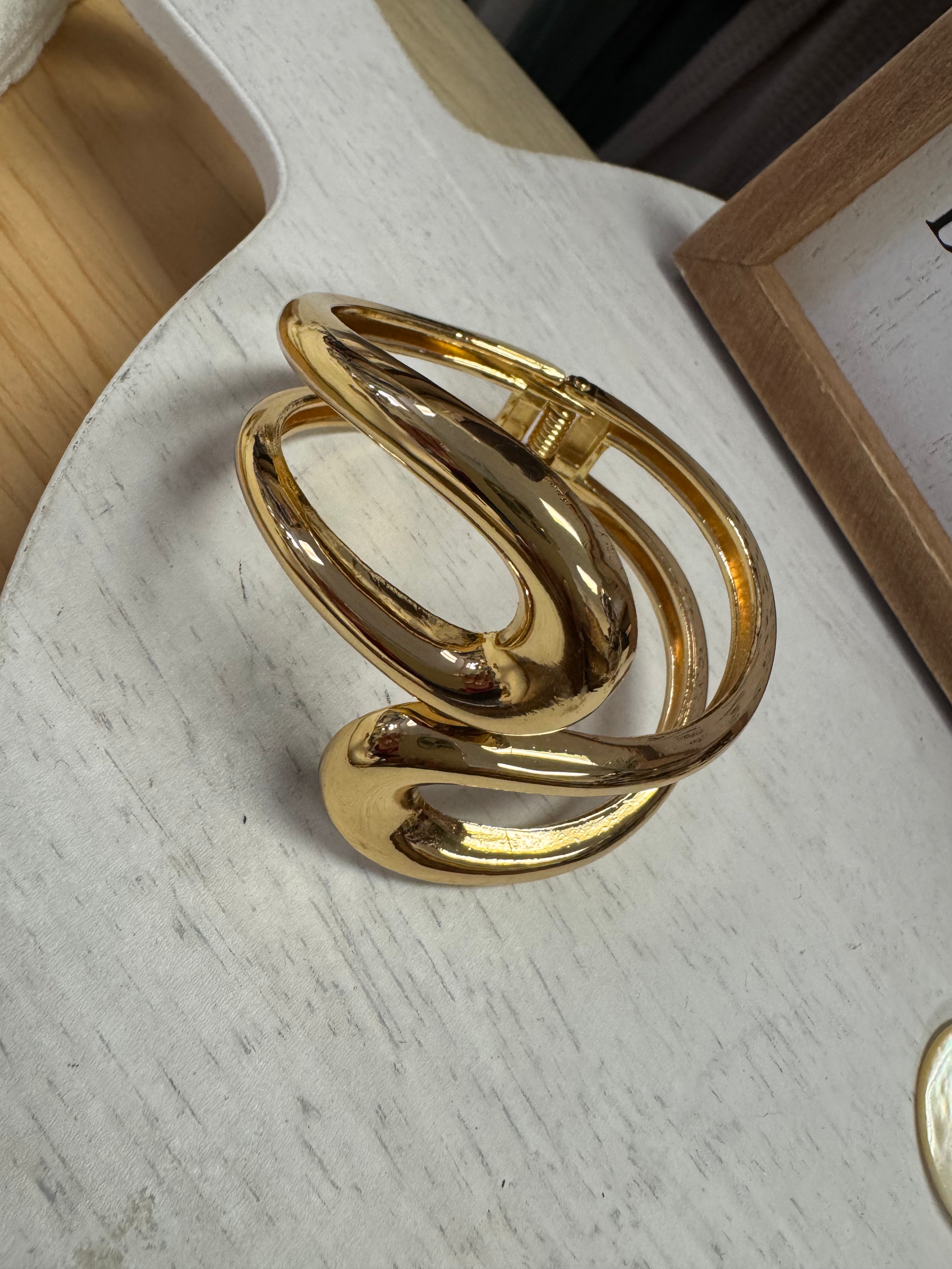 Curved bangle